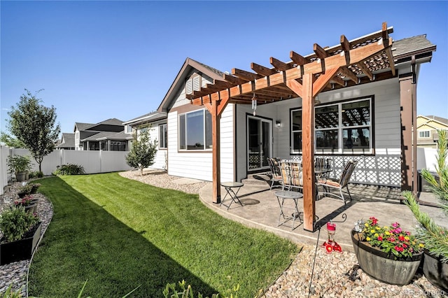 1210 Muskox St, Severance, CO 80550 - rear view of property featuring a pergola, a fenced backyard, and a patio