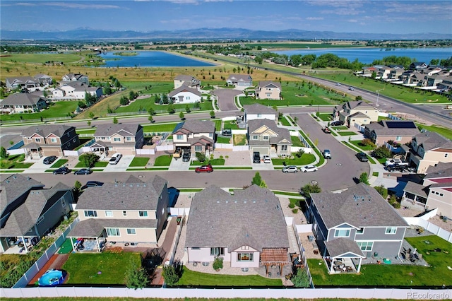 1210 Muskox St, Severance, CO 80550 - aerial view of residential area with a large body of water