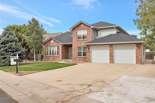 801 S 15th Ave, Brighton, CO 80601 - traditional home with concrete driveway, an attached garage, brick siding, and roof with shingles