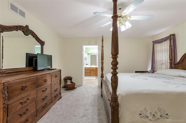 801 S 15th Ave, Brighton, CO 80601 - bedroom featuring light colored carpet, ensuite bath, and a ceiling fan