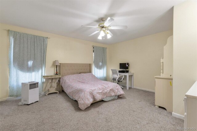 801 S 15th Ave, Brighton, CO 80601 - carpeted bedroom with an office area, ceiling fan, and baseboards