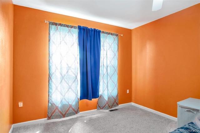 801 S 15th Ave, Brighton, CO 80601 - carpeted spare room featuring baseboards