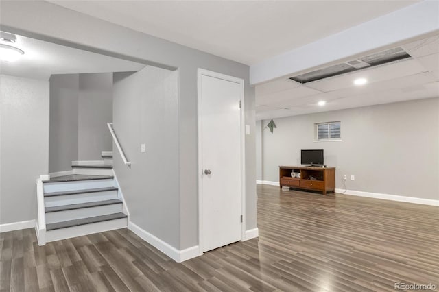 801 S 15th Ave, Brighton, CO 80601 - finished basement with wood finished floors, stairway, recessed lighting, and baseboards