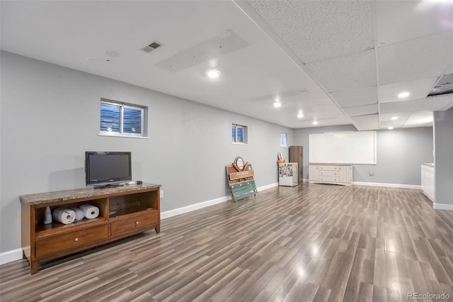 801 S 15th Ave, Brighton, CO 80601 - living room with wood finished floors, baseboards, and recessed lighting