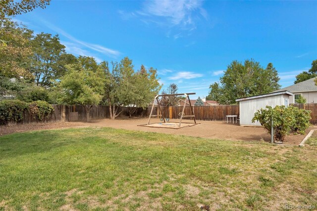 801 S 15th Ave, Brighton, CO 80601 - view of yard with a playground
