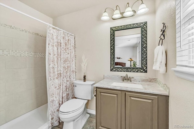 full bathroom with toilet, vanity, and shower / bath combination with curtain