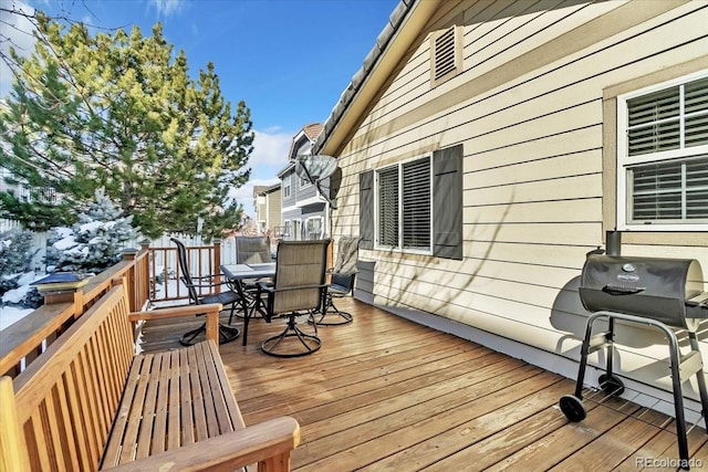 wooden deck with area for grilling