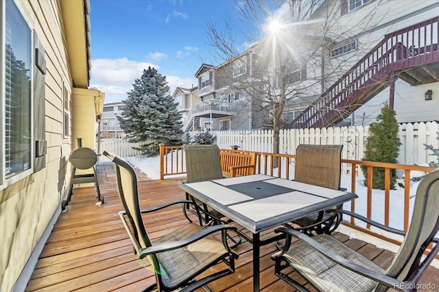 view of snow covered deck