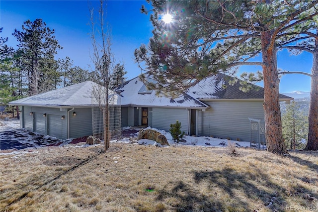 single story home featuring a garage