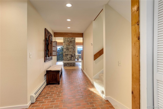 hallway with beamed ceiling and a baseboard radiator