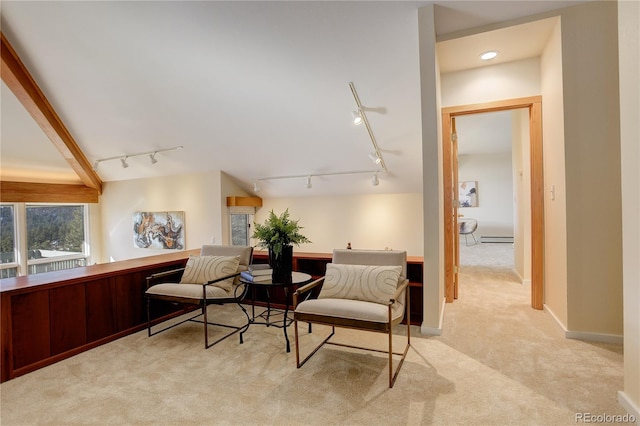 interior space with a baseboard radiator and light colored carpet