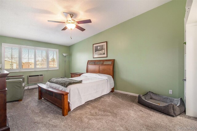 bedroom with ceiling fan, a wall mounted air conditioner, carpet flooring, and vaulted ceiling