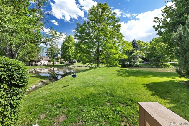 6305 W 6th Ave Unit C12, Lakewood, CO 80214 - view of green lawn with a water view