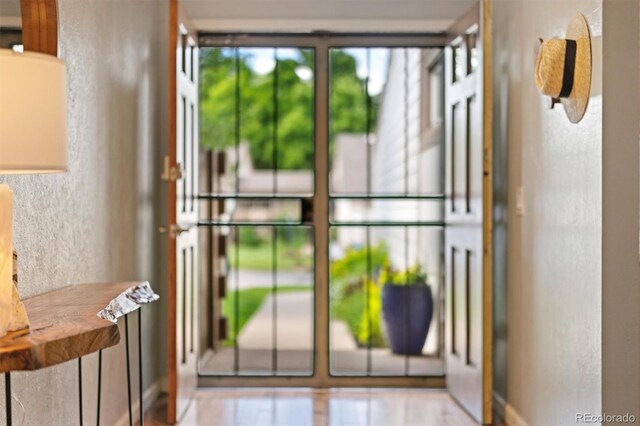 6305 W 6th Ave Unit C12, Lakewood, CO 80214 - foyer entrance with a textured wall