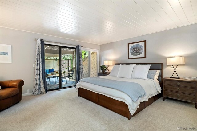 6305 W 6th Ave Unit C12, Lakewood, CO 80214 - bedroom with carpet, access to exterior, and wood ceiling