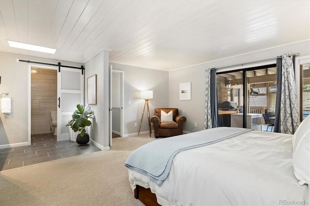 6305 W 6th Ave Unit C12, Lakewood, CO 80214 - bedroom with a barn door, access to outside, carpet, connected bathroom, and wooden ceiling
