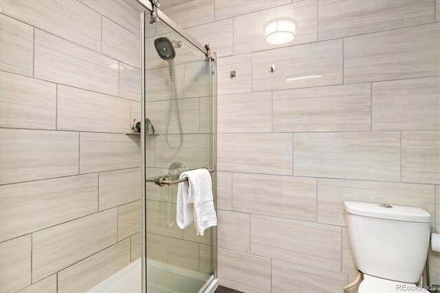 6305 W 6th Ave Unit C12, Lakewood, CO 80214 - full bathroom featuring a shower stall and toilet