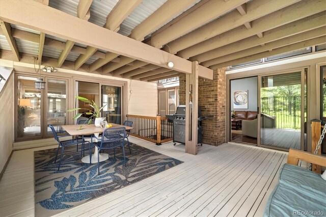 6305 W 6th Ave Unit C12, Lakewood, CO 80214 - wooden terrace with outdoor dining space and area for grilling