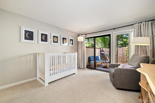 6305 W 6th Ave Unit C12, Lakewood, CO 80214 - bedroom featuring carpet flooring and access to outside