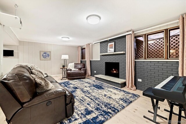 6305 W 6th Ave Unit C12, Lakewood, CO 80214 - living room with a fireplace and wood finished floors