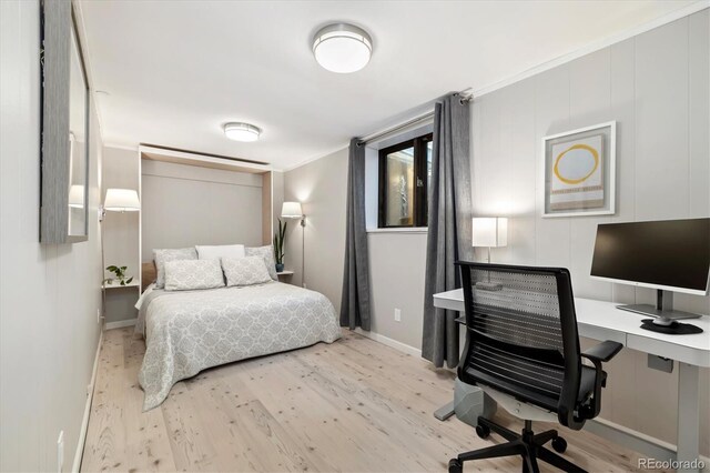 6305 W 6th Ave Unit C12, Lakewood, CO 80214 - bedroom featuring wood finished floors, an office area, and crown molding
