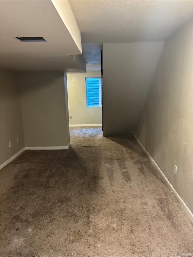 1222 Yosemite St, Denver, CO 80220 - basement featuring carpet and baseboards