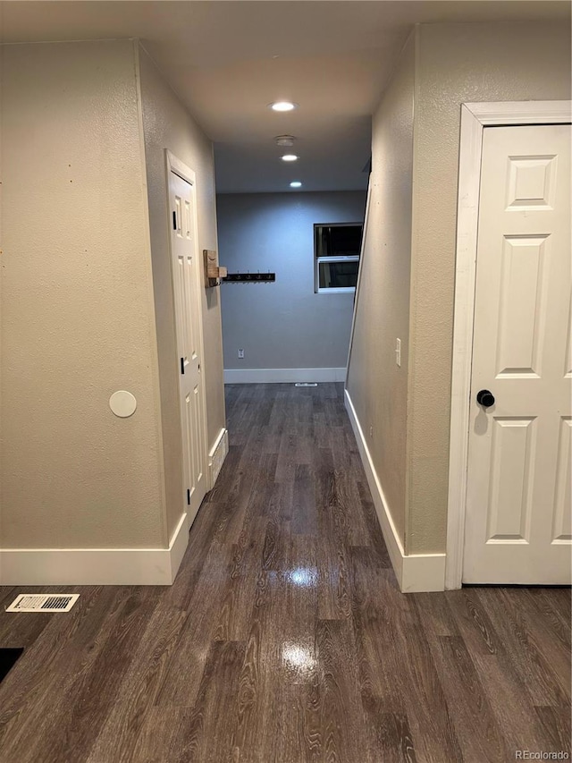 1222 Yosemite St, Denver, CO 80220 - hall featuring wood finished floors, recessed lighting, and a textured wall