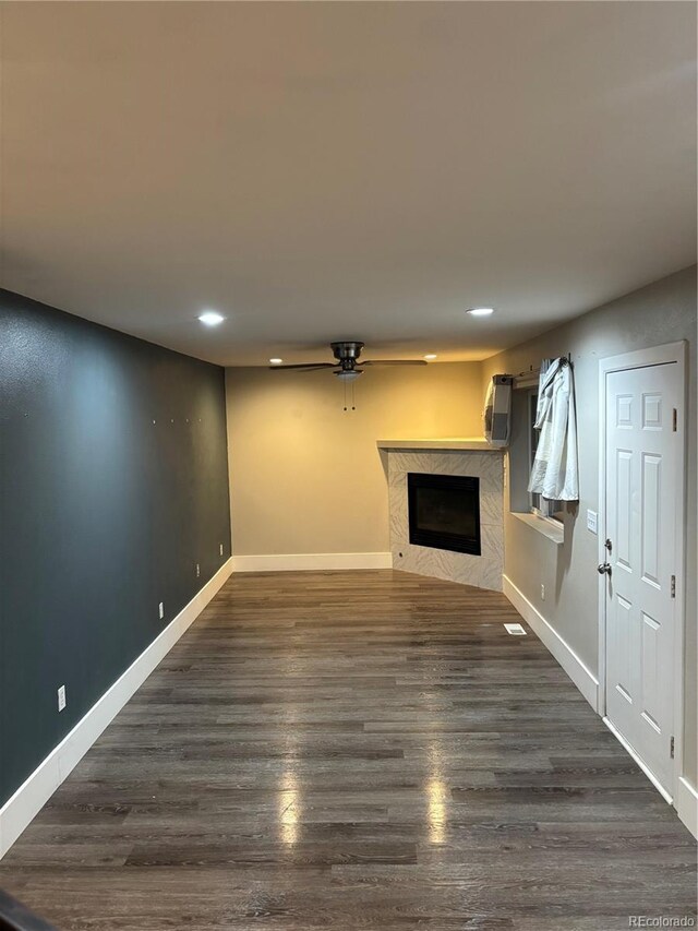 1222 Yosemite St, Denver, CO 80220 - unfurnished living room featuring a fireplace, recessed lighting, dark wood-style flooring, and a ceiling fan