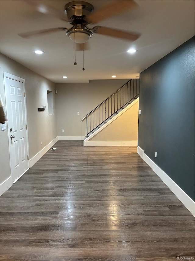 1222 Yosemite St, Denver, CO 80220 - unfurnished living room featuring ceiling fan, stairway, dark wood-style floors, and recessed lighting
