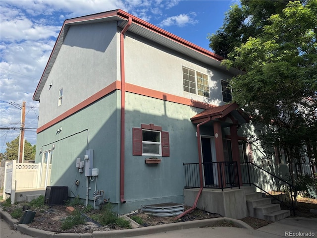 1222 Yosemite St, Denver, CO 80220 - view of property exterior featuring stucco siding