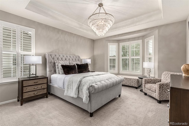 7991 Heritage Dr, Thornton, CO 80602 - bedroom with crown molding, light carpet, a raised ceiling, and a chandelier