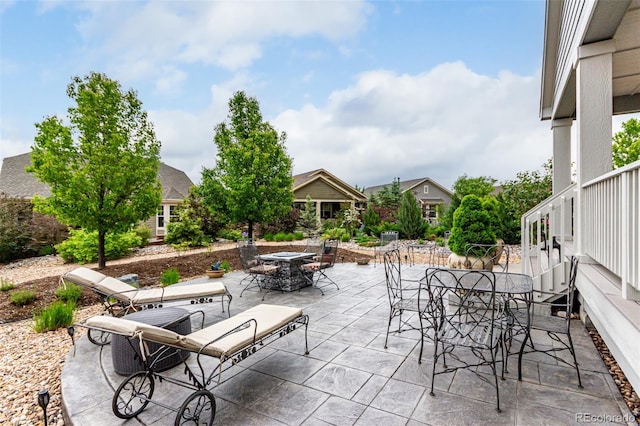 7991 Heritage Dr, Thornton, CO 80602 - view of patio / terrace with outdoor dining space