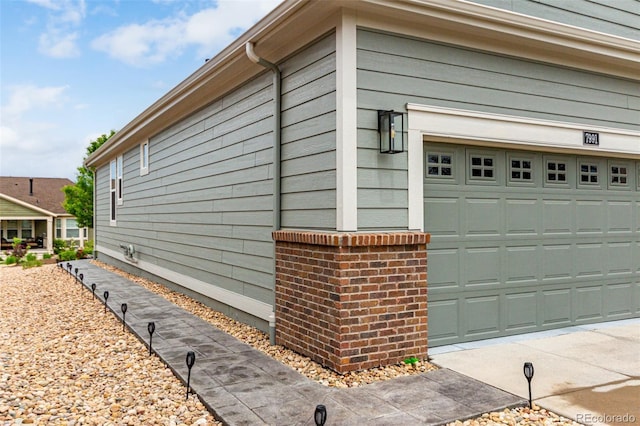 7991 Heritage Dr, Thornton, CO 80602 - view of side of property featuring a garage