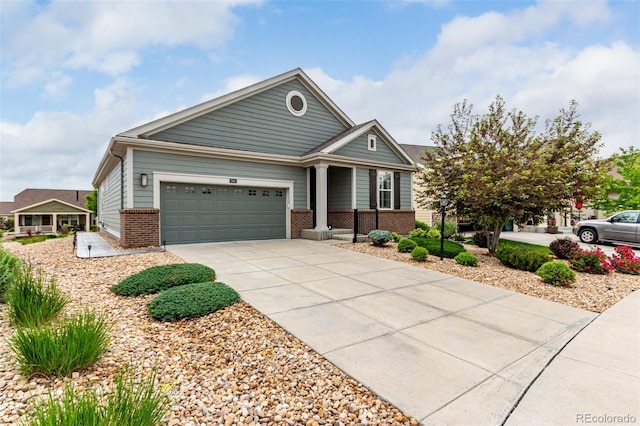 7991 Heritage Dr, Thornton, CO 80602 - view of front of property with brick siding, concrete driveway, and an attached garage
