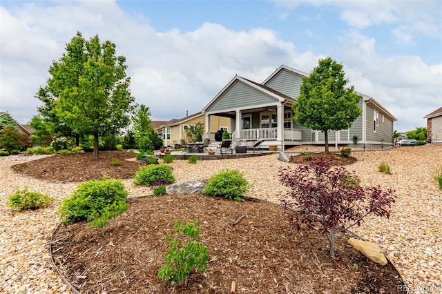 7991 Heritage Dr, Thornton, CO 80602 - view of front facade featuring a porch