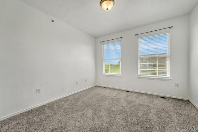 12711 Colorado Blvd Unit 714G, Thornton, CO 80241 - carpeted empty room featuring baseboards and vaulted ceiling