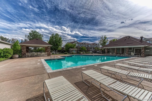 12711 Colorado Blvd Unit 714G, Thornton, CO 80241 - community pool featuring a gazebo and a patio