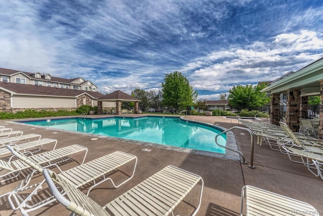 12711 Colorado Blvd Unit 714G, Thornton, CO 80241 - community pool featuring a gazebo and a patio