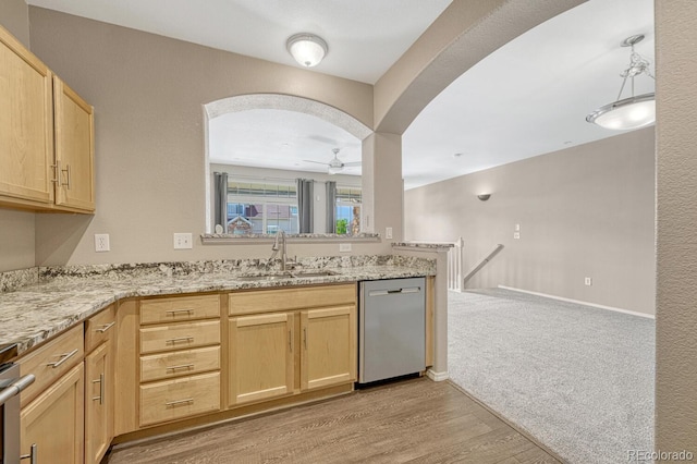 12711 Colorado Blvd Unit 714G, Thornton, CO 80241 - kitchen with stainless steel dishwasher, a sink, light brown cabinets, and light wood-style flooring