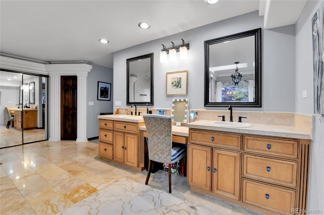 full bath featuring vanity, recessed lighting, and an inviting chandelier