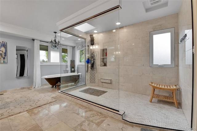 full bathroom with visible vents, a tile shower, an inviting chandelier, a soaking tub, and recessed lighting