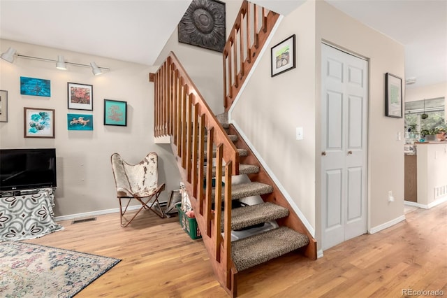 4636 S Dillon Ct Unit B, Aurora, CO 80015 - stairway with wood finished floors and baseboards