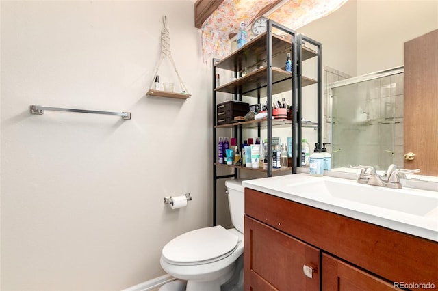 4636 S Dillon Ct Unit B, Aurora, CO 80015 - bathroom with toilet, vanity, a tile shower, and baseboards