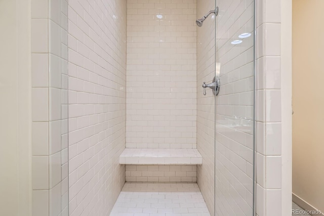 full bath featuring a shower stall
