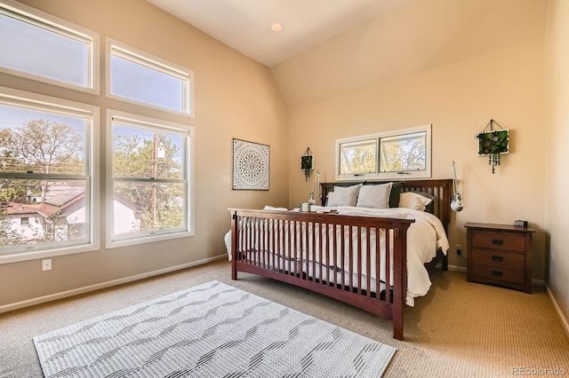 835 Niagara St, Denver, CO 80220 - bedroom with multiple windows, light colored carpet, and lofted ceiling