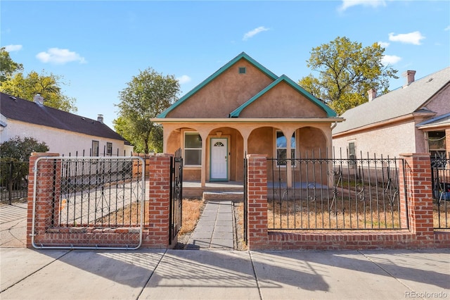 view of front of property featuring covered porch