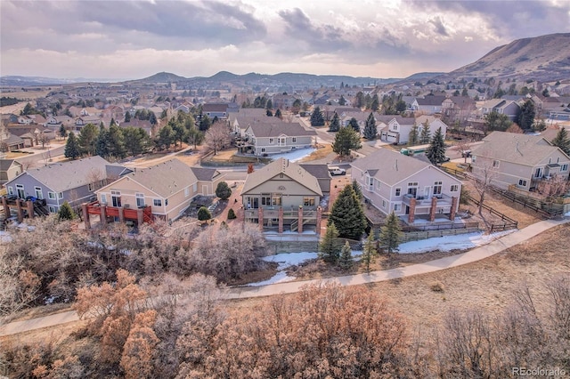 birds eye view of property with a residential view and a mountain view