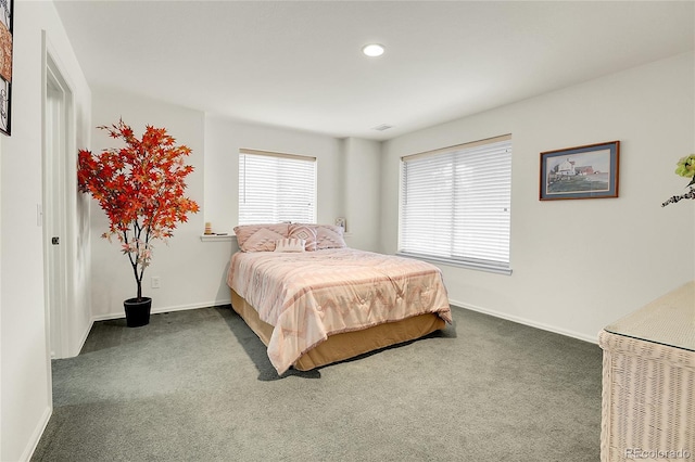 bedroom featuring dark colored carpet, baseboards, and recessed lighting