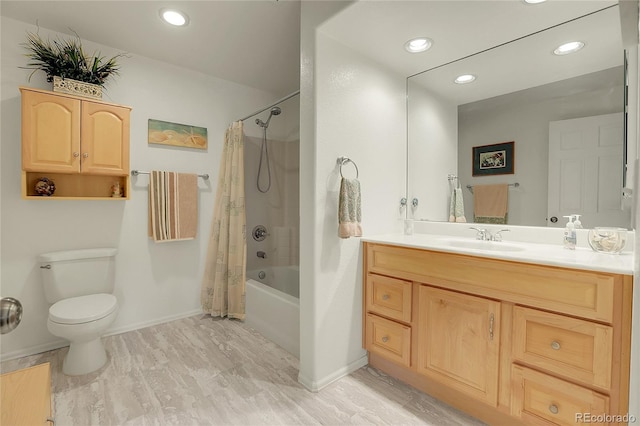 full bathroom featuring toilet, recessed lighting, vanity, baseboards, and shower / tub combo with curtain