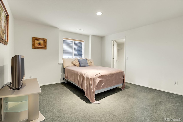 bedroom with baseboards, dark carpet, and recessed lighting